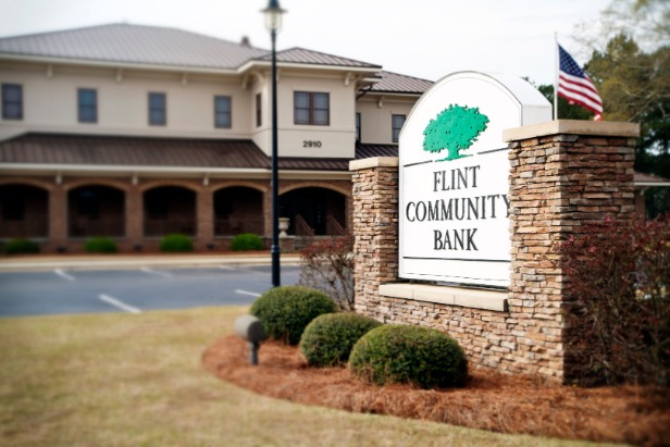 Flint Community Bank sign in front of bank